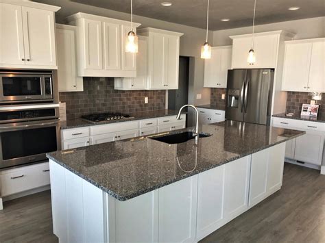 steel grey granite with off white cabinets|grey granite cabinets.